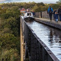 Buy canvas prints of Canal boat on the Pontcysyllte Aqueduct by Clive Wells