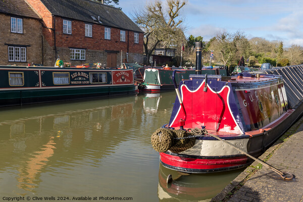 Narrow boats at rest Picture Board by Clive Wells
