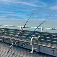 Buy canvas prints of Fishing on the pier, by Clive Wells