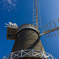 Buy canvas prints of Bircham Windmill under blue Norfolk skies by Clive Wells