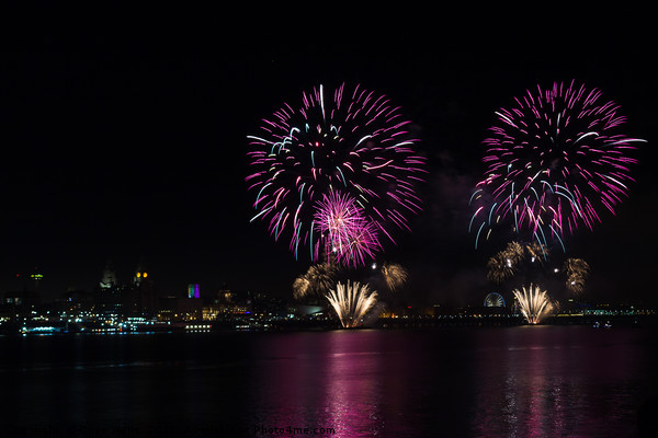 Waterfront fireworks over Liverpool Picture Board by Clive Wells