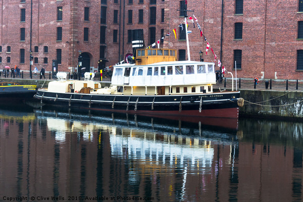 Pleasure boat in Albert Dock, Liverpool Picture Board by Clive Wells