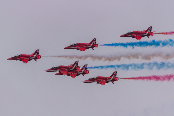 Red Arrows with coloured smoke on at Duxford Picture Board by Clive Wells