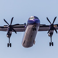 Buy canvas prints of De Havilland Canada DHC-8-400 seen coming in to Ca by Clive Wells