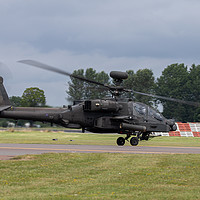 Buy canvas prints of Apache Longbow taking off from RAF Fairford by Clive Wells