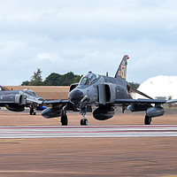 Buy canvas prints of Both F-4E phantoms about to depart RAF Fairford by Clive Wells