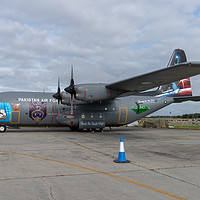 Buy canvas prints of Lockheed C-130E Hercules at RAF Fairford by Clive Wells