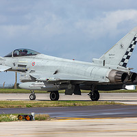Buy canvas prints of Italian Eurofighter Typhoon at RAF Waddington by Clive Wells