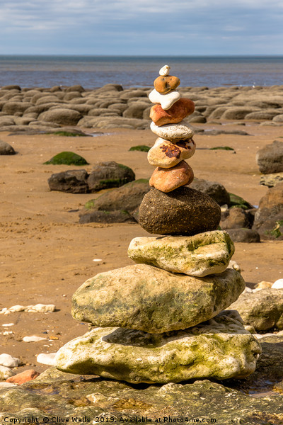 Stones at Old Hunstanton beach in Norfolk Picture Board by Clive Wells