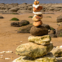 Buy canvas prints of Stones at Old Hunstanton beach in Norfolk by Clive Wells