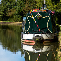 Buy canvas prints of Moored boat on the Grand Union Canal at Blisworth by Clive Wells