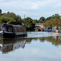 Buy canvas prints of Busy day on the Grand Union Canal in Blisworth by Clive Wells