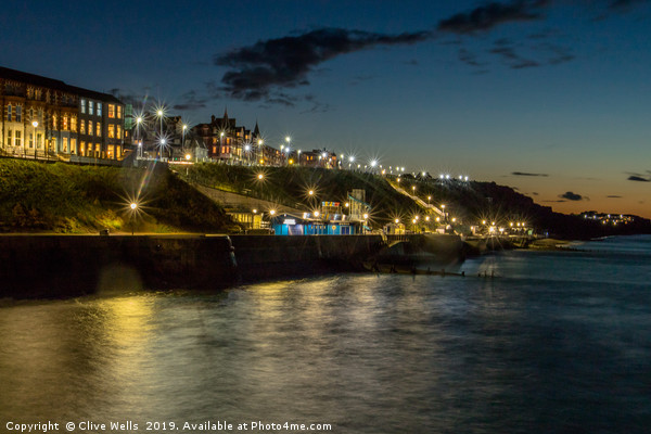 Cromer at night taken from the pier in Norfolk Picture Board by Clive Wells
