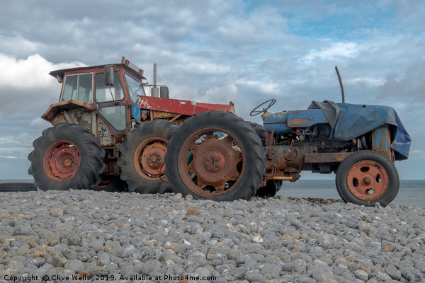 Tractors at Cromer in North Norfolk Picture Board by Clive Wells