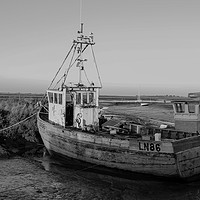 Buy canvas prints of Monochrone fishing boat at Brancaster Staith by Clive Wells