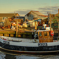 Buy canvas prints of Fishing boat at Brancaster Staith in Norfolk by Clive Wells