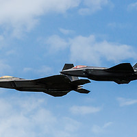 Buy canvas prints of F-22A Raptor & F-35A Lightning II at rAF Fairford by Clive Wells