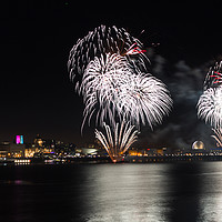 Buy canvas prints of Fireworks over waterfront at Liverpool by Clive Wells