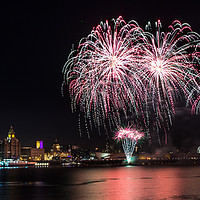 Buy canvas prints of Fireworks over the waterfront at Liverpool by Clive Wells