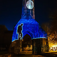 Buy canvas prints of Walking soldier with the moon seen at Kings Lynn  by Clive Wells