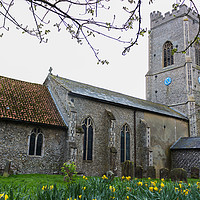 Buy canvas prints of Daffodils in front of St. Faith`s Church, Gaywood by Clive Wells