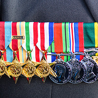 Buy canvas prints of Proud row of medals by Clive Wells