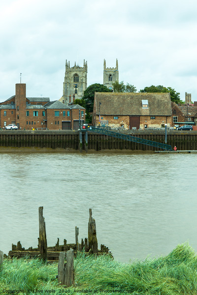 View of Kings Lynn from over the River Great Ouse. Picture Board by Clive Wells