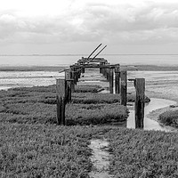 Buy canvas prints of Black & white picture of the old pier at Snettisha by Clive Wells