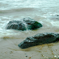 Buy canvas prints of Incoming tide on the rocks at Old Hunstanton by Clive Wells