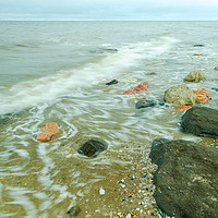 Buy canvas prints of Swirles on the incoming tide at Hunstanton. by Clive Wells