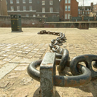 Buy canvas prints of Chains on the old docks at Kings Lynn in Norfolk by Clive Wells