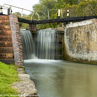 Buy canvas prints of Close in of lock gates at Stoke Brurne. by Clive Wells