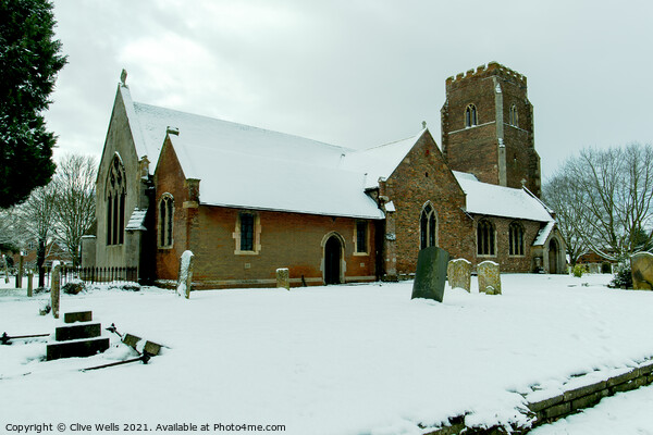 St. Faiths Church covered in snow Picture Board by Clive Wells