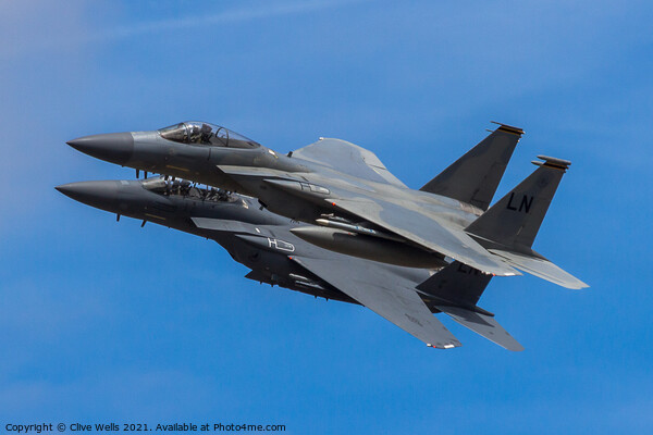 A pair of F-15 Eagles overfly Picture Board by Clive Wells