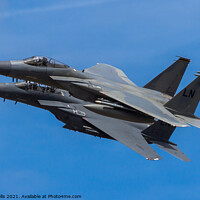 Buy canvas prints of A pair of F-15 Eagles overfly by Clive Wells