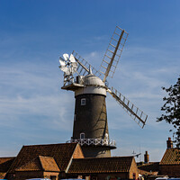 Buy canvas prints of Bircham Windmill in Norfolk seen in bright sunlight by Clive Wells