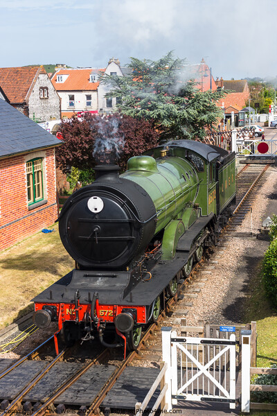 Steam train waiting. Picture Board by Clive Wells