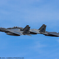 Buy canvas prints of Three F-15`s overfly RAF Fairford by Clive Wells