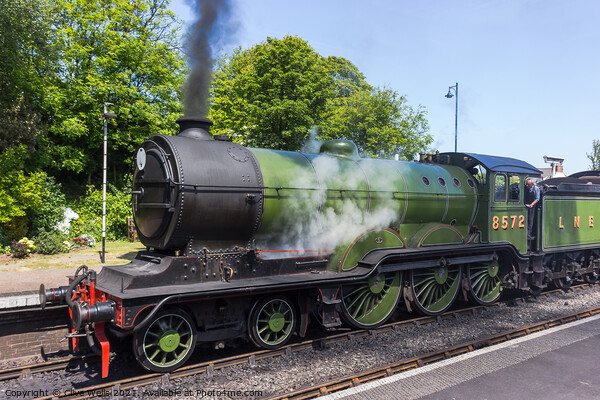 Old steam train fired up and ready to go. Picture Board by Clive Wells