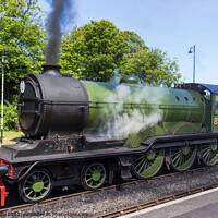 Buy canvas prints of Old steam train fired up and ready to go. by Clive Wells