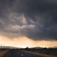 Buy canvas prints of Road trip with stormy sky by Sue Hoppe