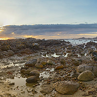 Buy canvas prints of sunrise over rocky shoreline by Sue Hoppe