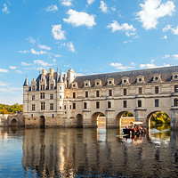 Buy canvas prints of Chateau de Chenonceau and pleasure boat by Lenscraft Images