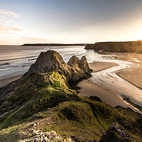Buy canvas prints of Sunset at Three Cliffs by Drew Davies
