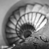 Buy canvas prints of Old spiral staircase in black and white by Valerio Rosati
