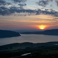 Buy canvas prints of Sunsetting over Portree, Isle of Skye, Scotland. by Phill Thornton