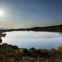 Buy canvas prints of Sunset over Loch na Clarlaich to the Isle of Skye. by Phill Thornton