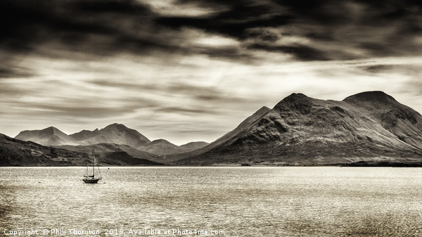 Stormy skies over the The Sound of Raasay Framed Mounted Print by Phill Thornton