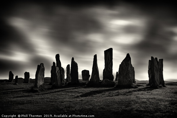Sunset over the  Callanish Standing Stones Picture Board by Phill Thornton
