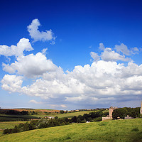 Buy canvas prints of Borthwick Castle and blue skies by Phill Thornton